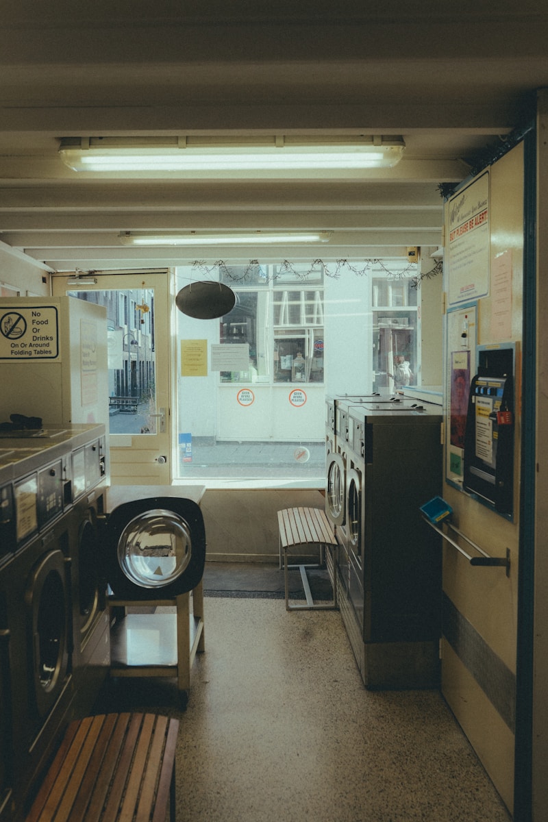 a room with a washer and dryer inside of it