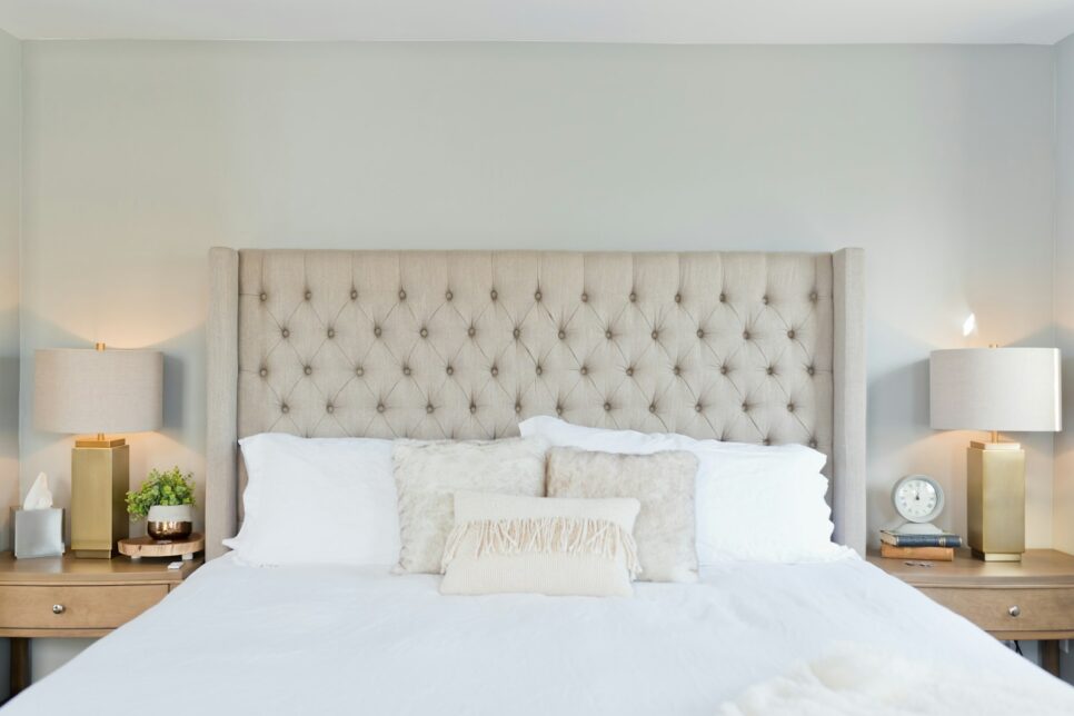 white bed linen with white pillows