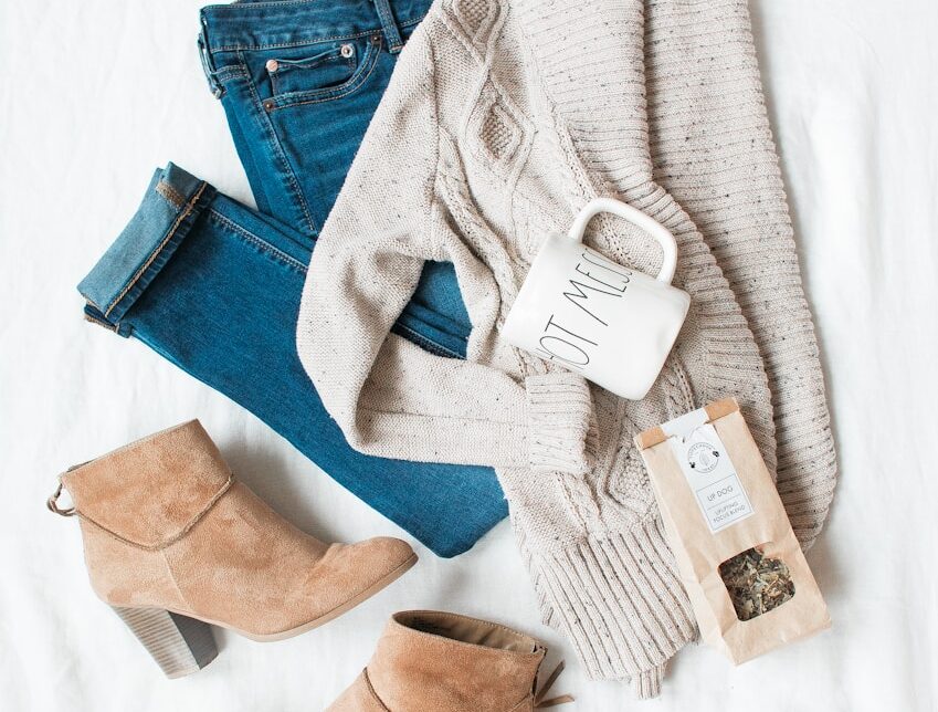 gray cardigan, blue jeans, and pair of brown chunky heeled shoes