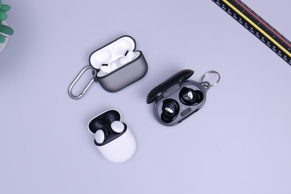 black and white headphones on white table