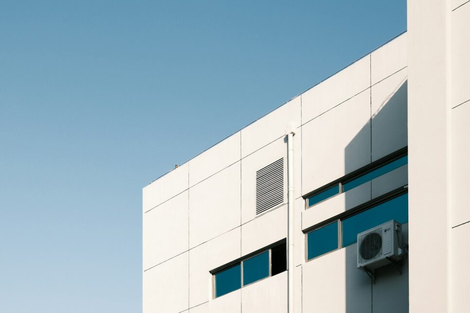 white concrete building under blue sky during daytime