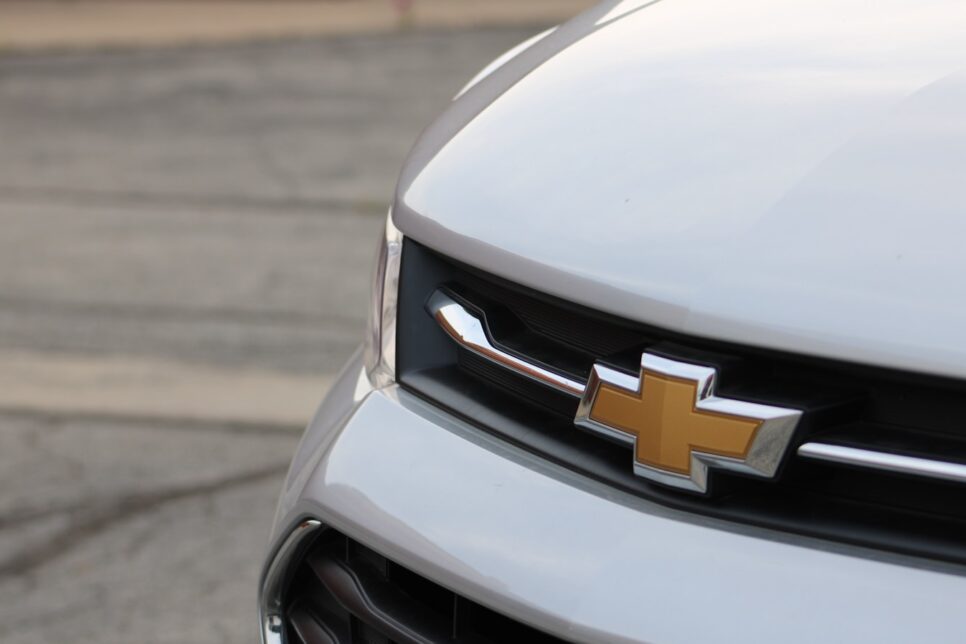 white chevrolet car on road during daytime